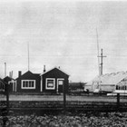 First home and greenhouse in Anchorage, 4th Avenue and A Street, 1923.