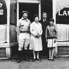Dick Scott, Lillian Scott Dool, Burt Dool, and Doris DeHon Dool in front of the Pioneer Laundry (739 4th Avenue, Anchorage), early 1930s.