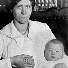 Josephine Erickson with son John, Flat, Alaska, 1920.