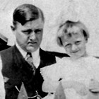 Raymond "Ray" or "R.C." Larson with daughter Helen, ca. 1920.