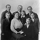 Odilla "Odile" and Paul Meier with six of their seven sons:  Paul H., Herman, Alvin, Sylvan, Arthur "Art," and Edwin.  Photograph, 1919.