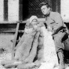Harry and daughter Renee on her first birthday on Atka, 1912, where Kathryn was teaching.  The furs were gifts to Renee.