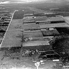 An aerial view of the early park strip, possibly when it was being used as an air field, and also showing the “greens” for the golf course which shared the same land.  After serving as mayor, James Delaney was the chairman for a city appointed parks committee, and reported to the city council on park issues.  Delaney Park, commonly known as "the Park Strip," was later named in his honor.  