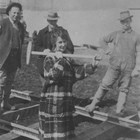 Martha’s daughter, named Martha after her mother but usually known as “Babe,” is shown here driving the first spike on a spur line of the Alaska Railroad on April 29, 1915.  This line was built to carry supplies from tidewater at Ship Creek to where the railroad workshops were to be built.